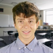 Jimmy Bragg Smiling teen boy with dark hair